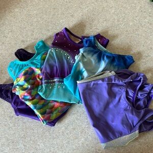 Lot of CS gymnastics leotards. 5 clean and in good condition name brand leos.
